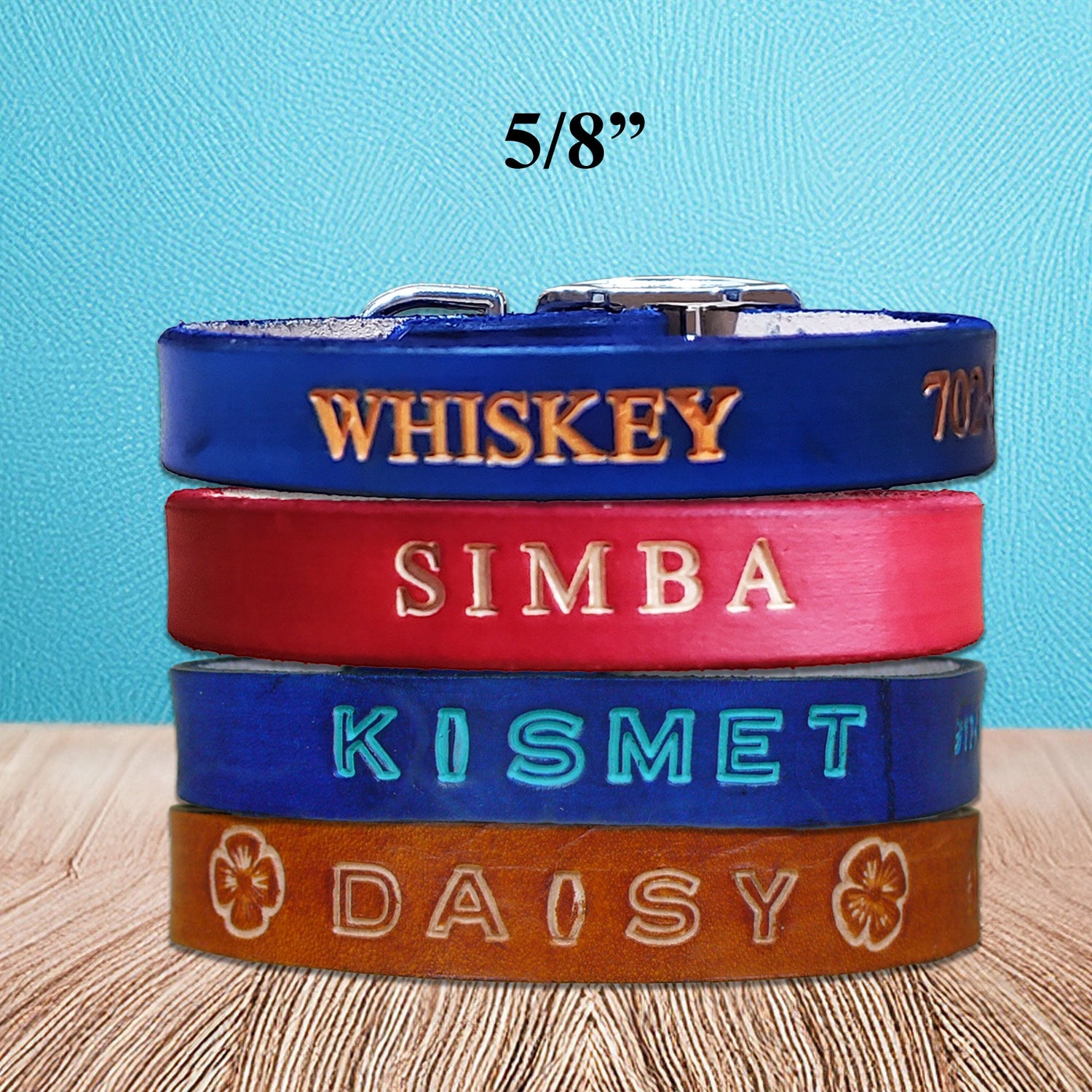 Assorted personalized leather collars for small dogs, handcrafted and available in multiple colors and letters..