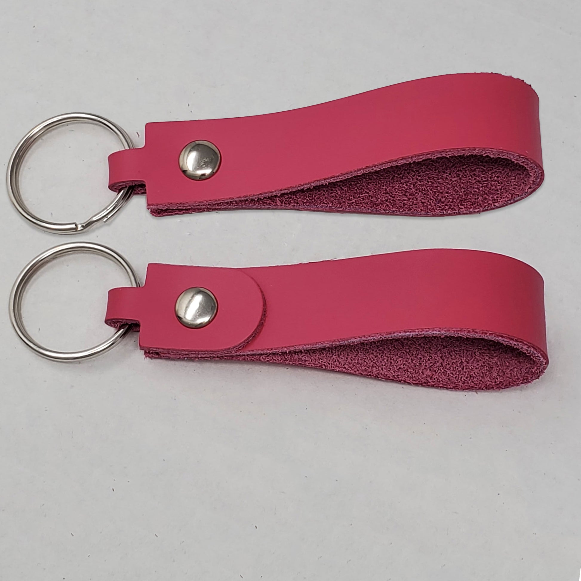 Hot pink leather keyring blank close up