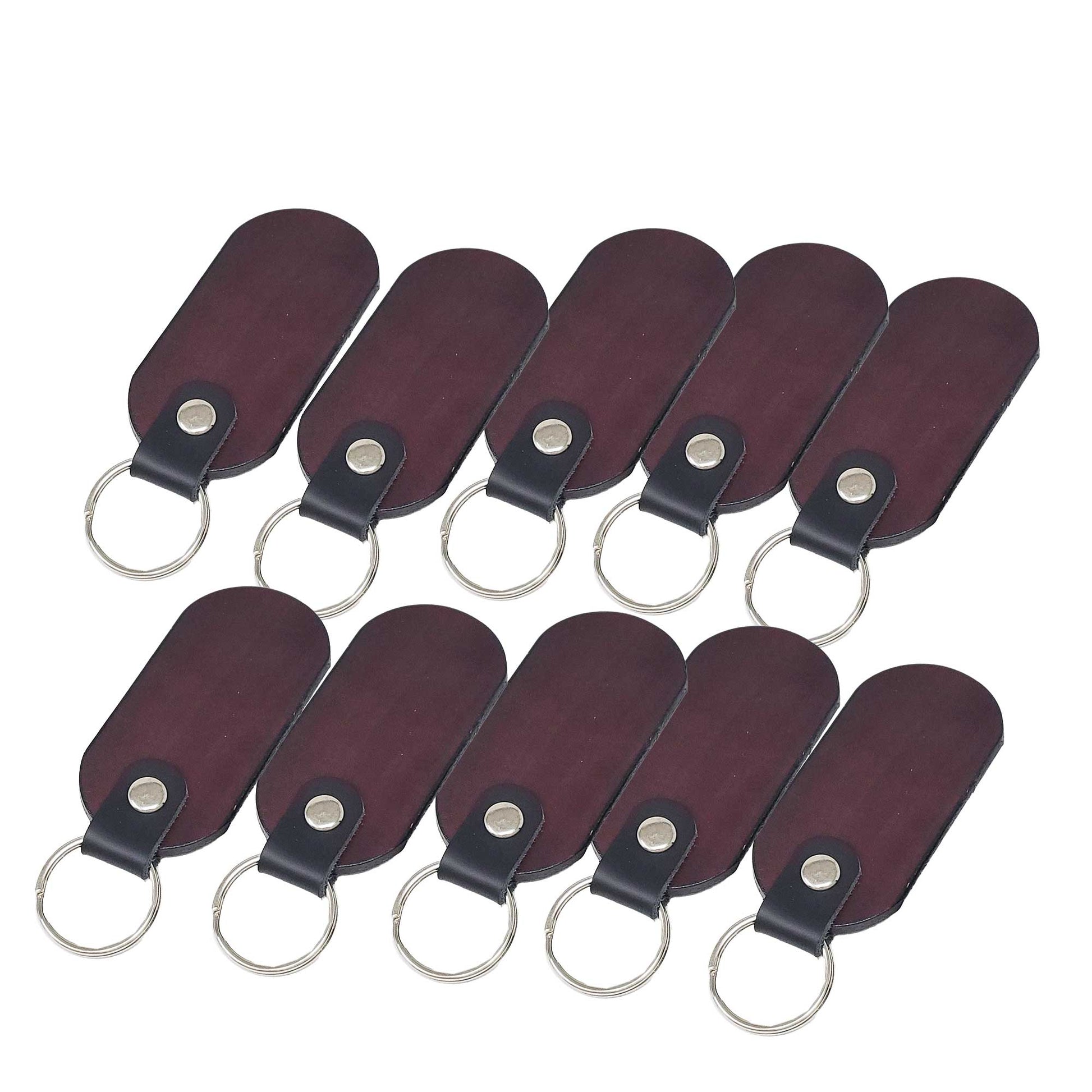 Mahogany colored vegetable tanned leather keychains stamping , tooling and engraving ready. Premium quality and ready to customize.