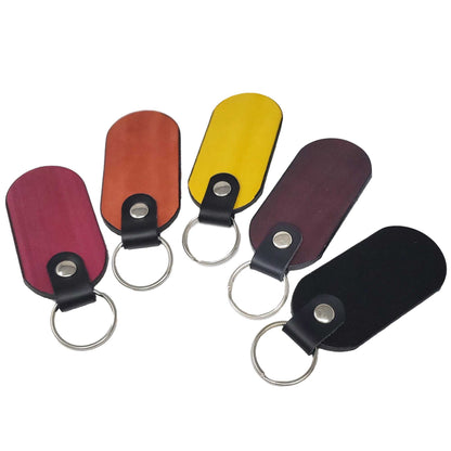 Blank colored vegetable tanned leather key-fobs stamping , tooling and engraving ready. Premium quality and ready to customize.